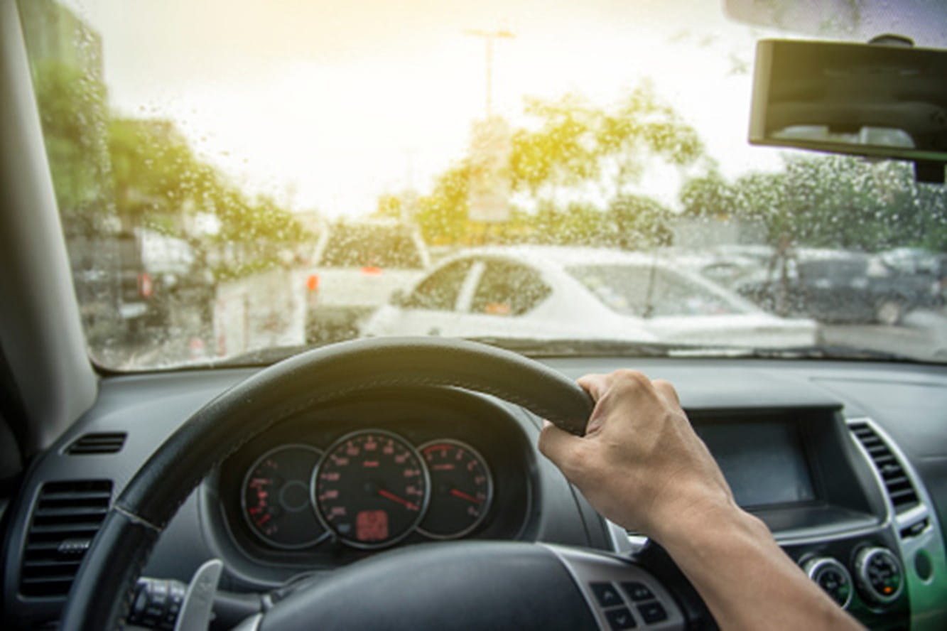 A man is driving his car in Surrey, BC