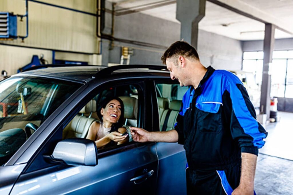 A girl is done with her car servicing in in Surrey, BC